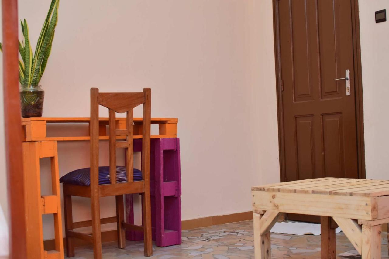 Akwa Guesthouse Котону Екстериор снимка