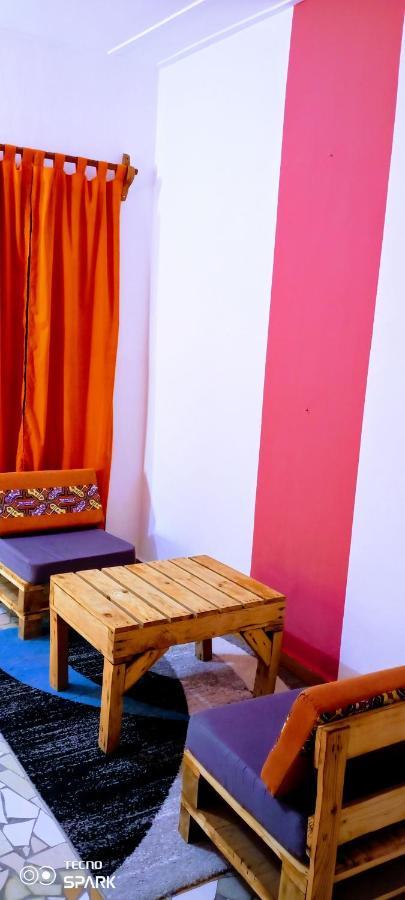 Akwa Guesthouse Котону Екстериор снимка